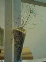 Wall vase with wire flowers
